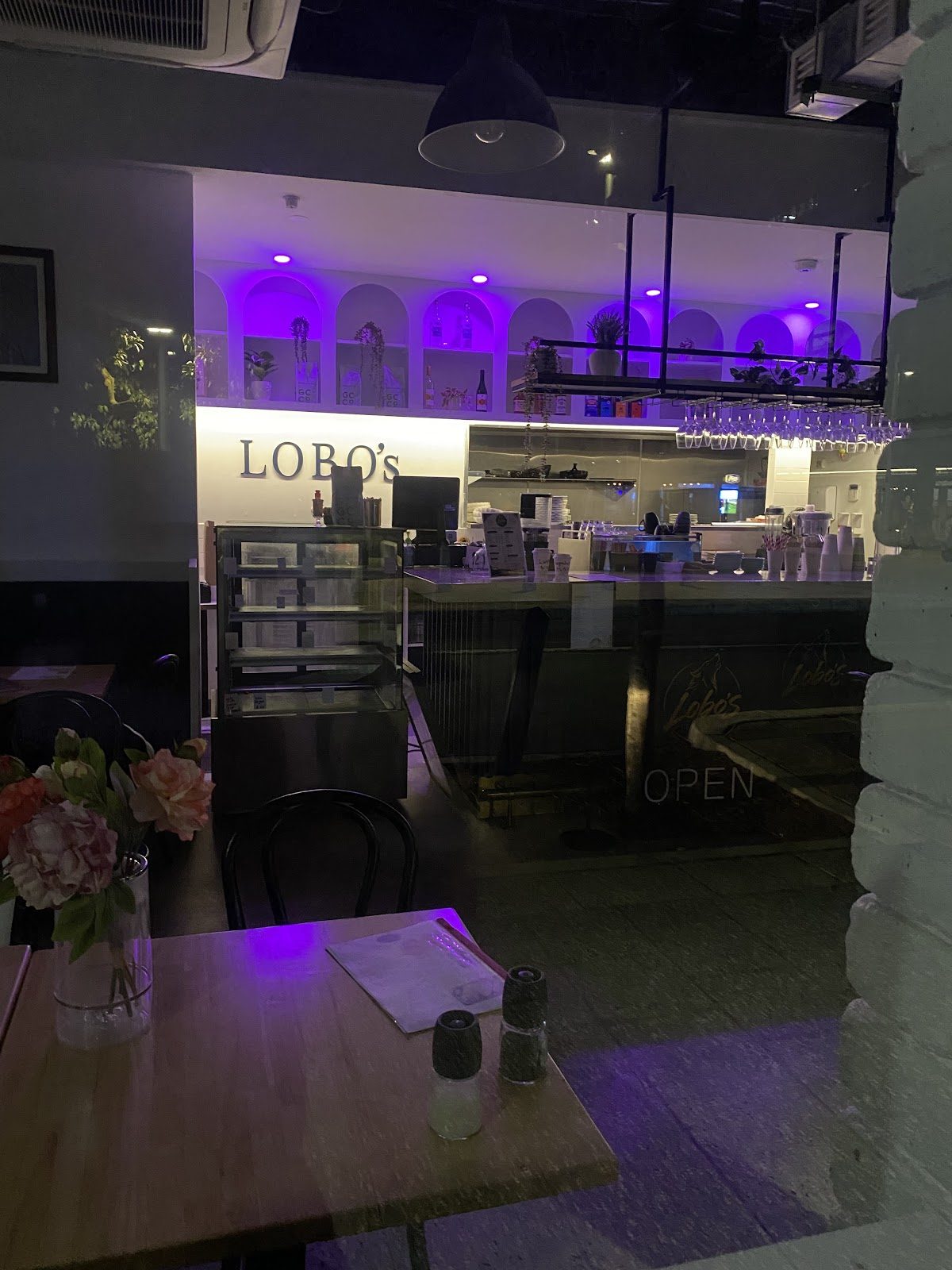 The counter at Lobo’s Fremantle, seen through the front window